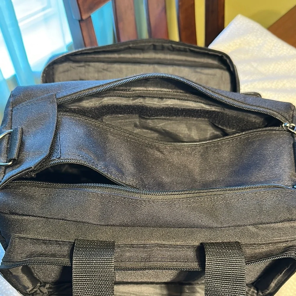 Black Duffel Bag with Rigid Structure and Durable Fabric